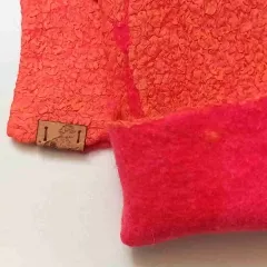 Lebensfreude-Pulsschlag – Farbenfrohe Armstulpen in Pink und Orange